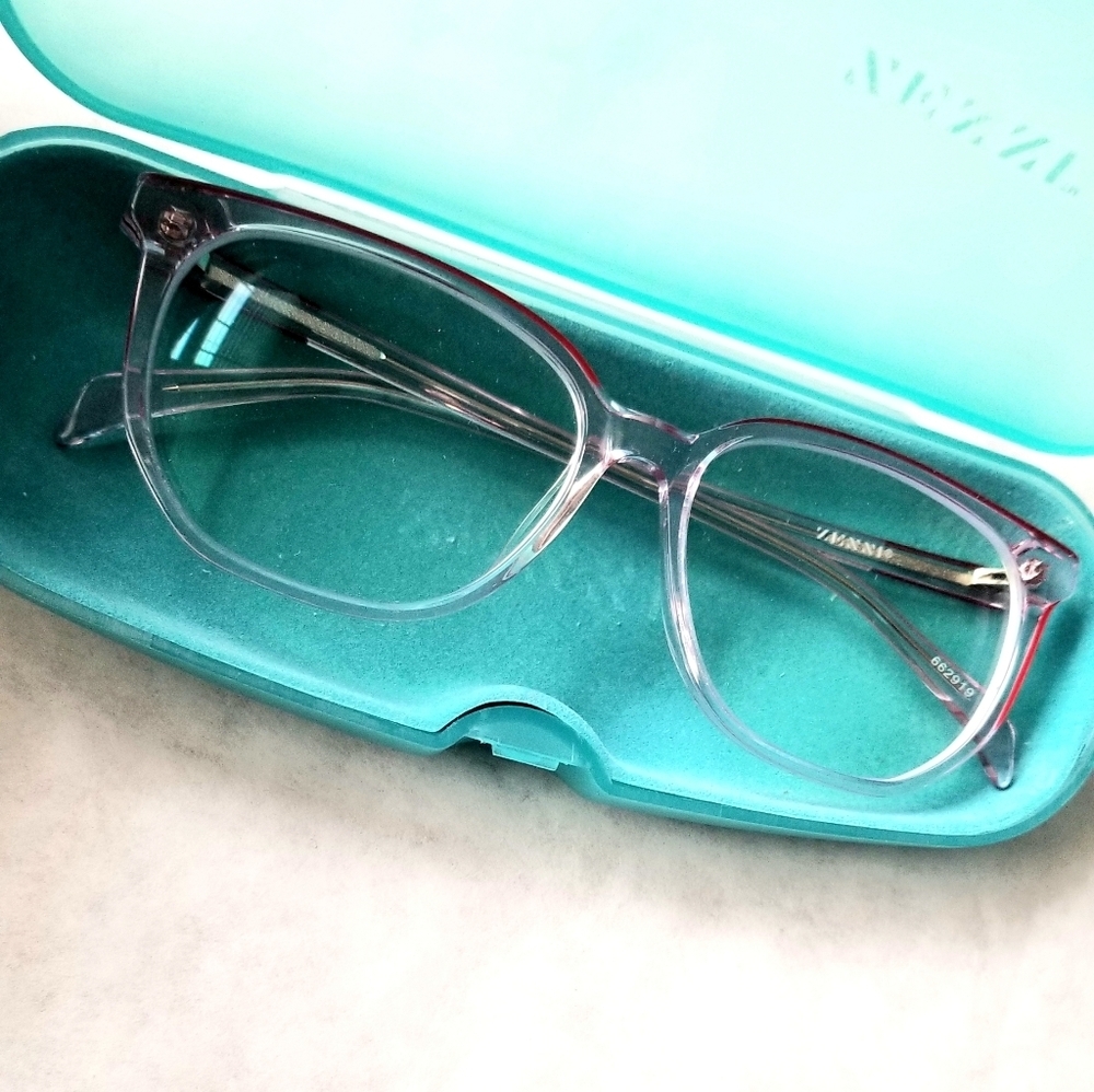 Zenni clear glass frames with red accent on top of frames with hard blue…